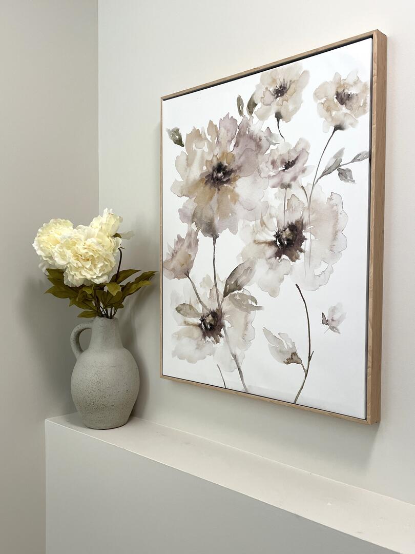 Neutral floral art with vase of faux flowers