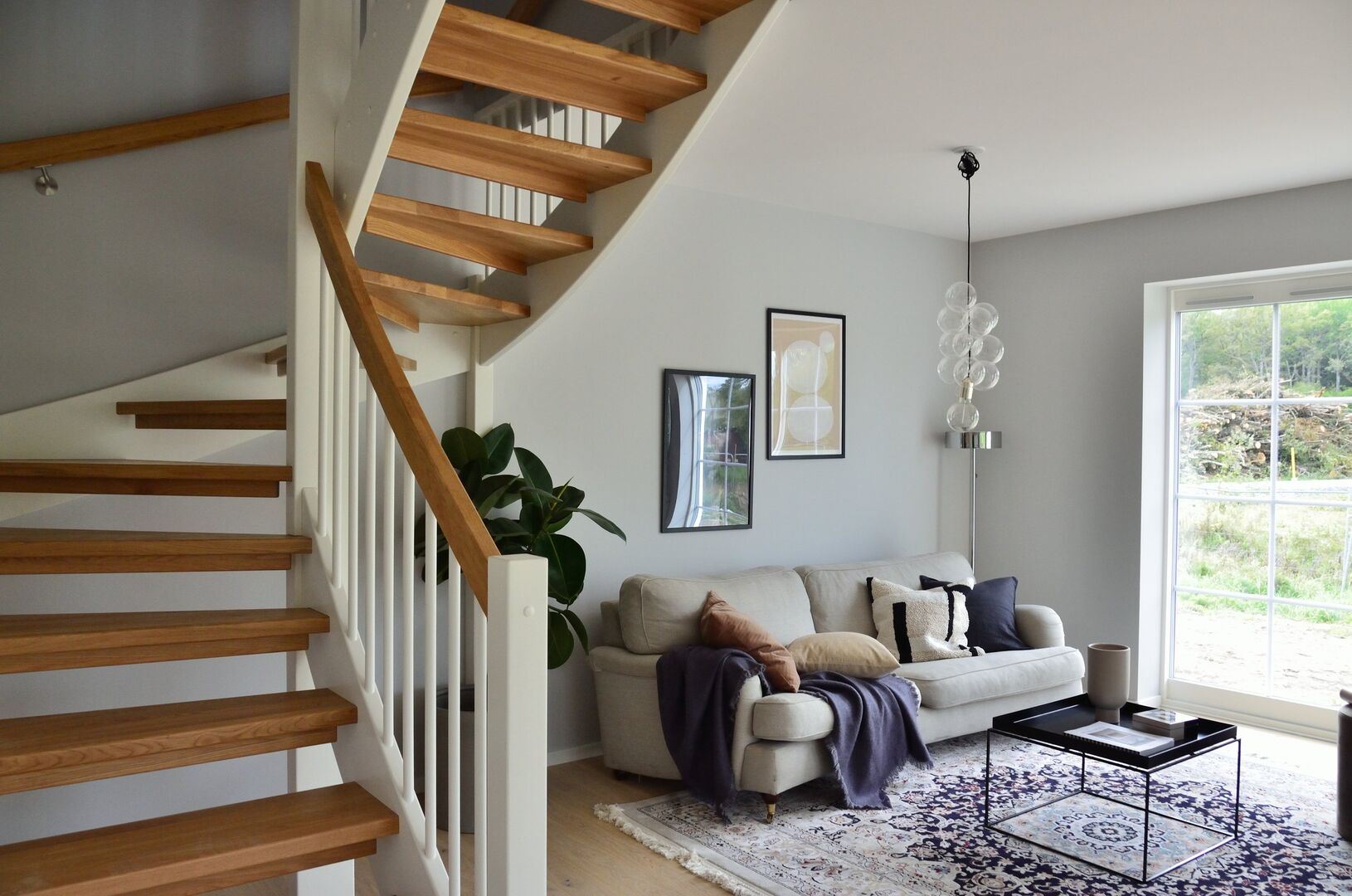 Open concept living room with natural elements