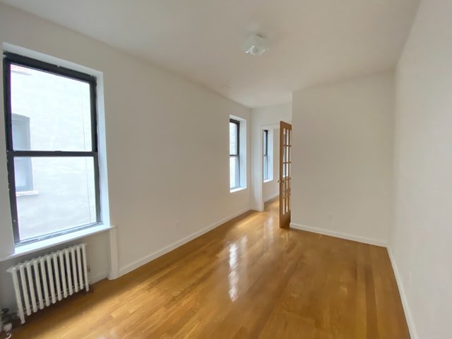 Living room space in a closed floor plan home