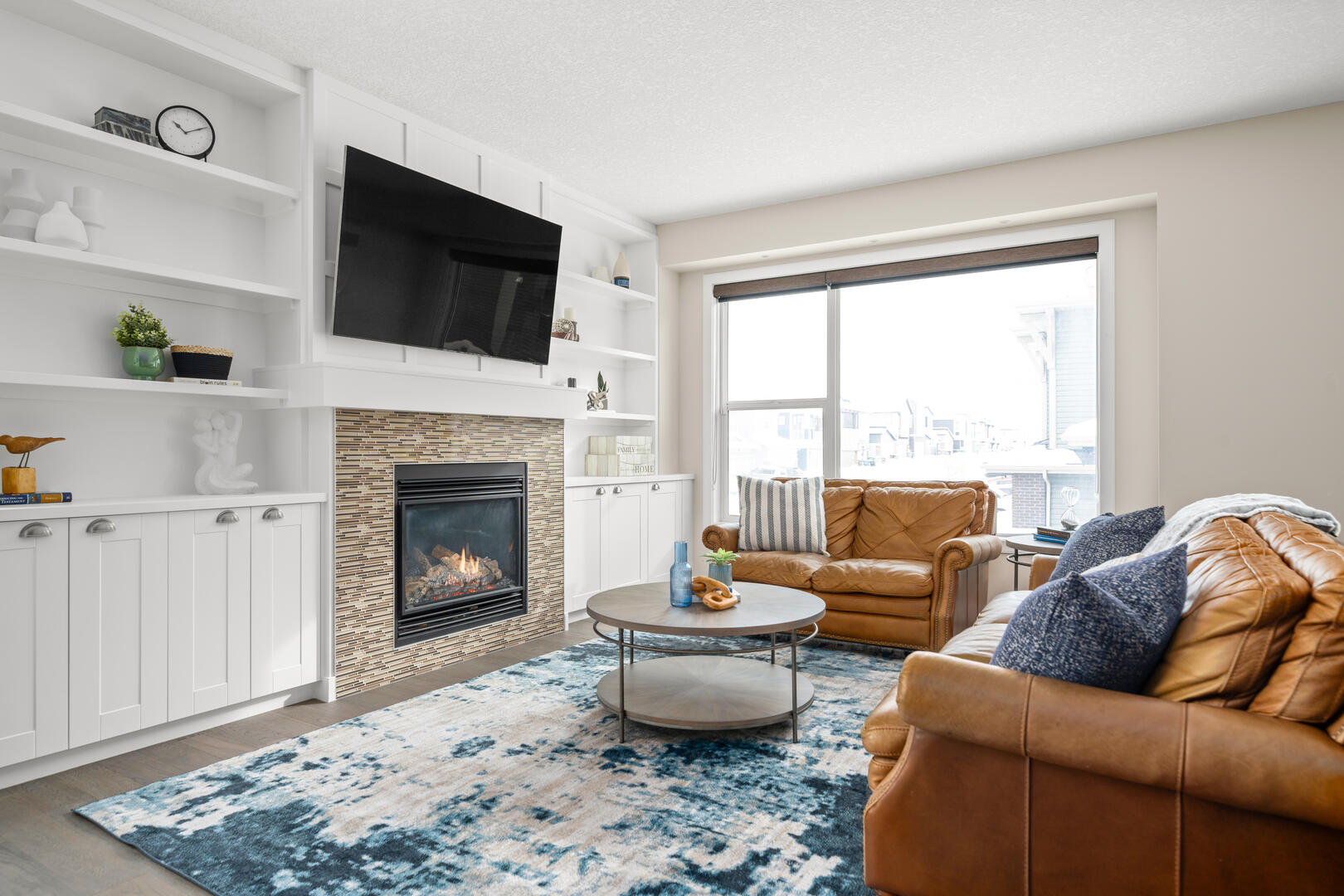 modern living room white built-ins with fireplace